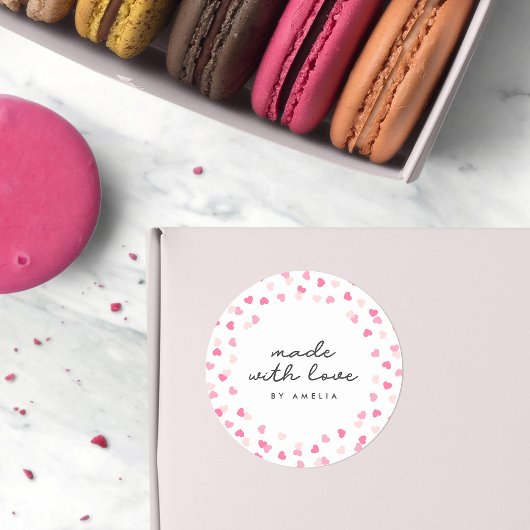 Verspreide roze harten gemaakt van Confetti met li Ronde Sticker