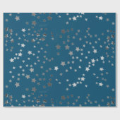 Verspreide sterren op blauw cadeaupapier (Vlak)