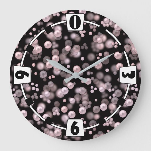 Verspreiding van roze en witte parels op zwarte ve grote klok (Voorkant)