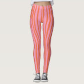 Verticale retrogolvende lijnen - pastel oranje en leggings (Voorkant)