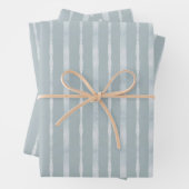 Verticale strepen in stoffig blauw en glinsterend inpakpapier vel (In situ)