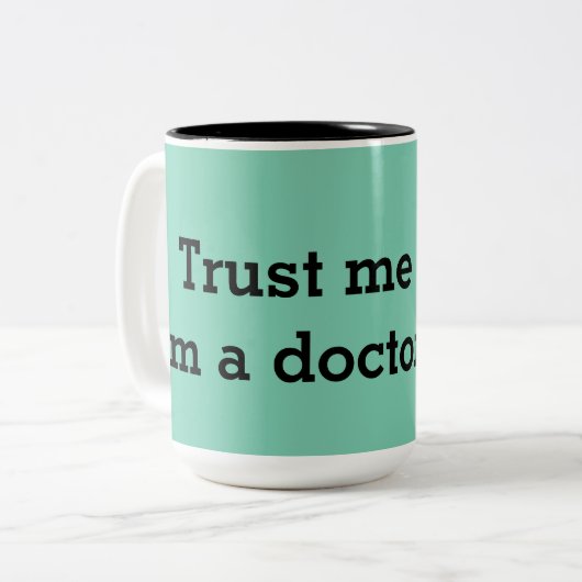 Vertrouw me, ook tweekleurige koffiemok (Voorkant links)