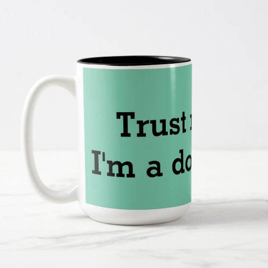 Vertrouw me, ook tweekleurige koffiemok (Links)