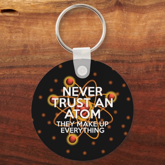 VERTROUW NOOIT EEN ATOOM SLEUTELHANGER (Voorkant)