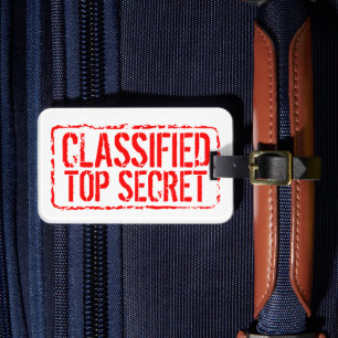 Vertrouwelijk top secret rode rubberen stempel op bagagelabel