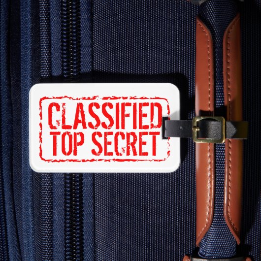 Vertrouwelijk top secret rode rubberen stempel op bagagelabel (Voorkant Insitu 4)