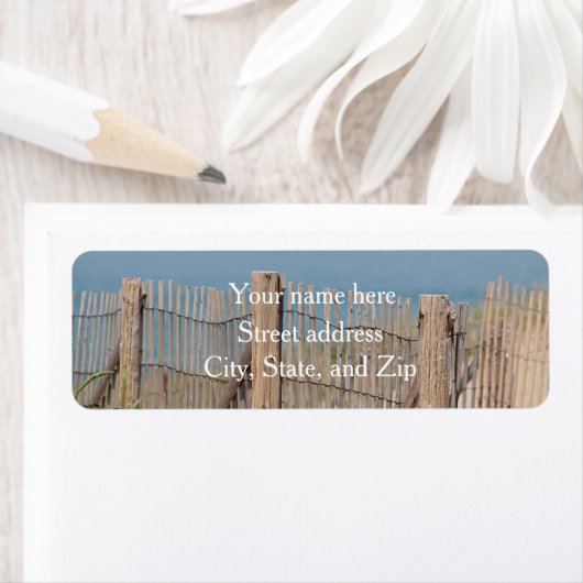 Verweerde strandomheining etiket (Insitu)