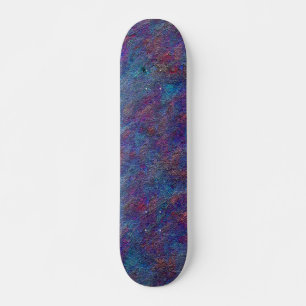 Verzamelde cyaan- en rode verfsplatters persoonlijk skateboard