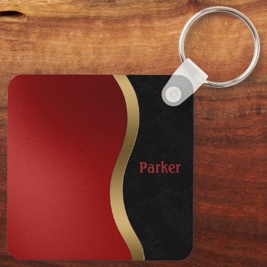 Vet Matig Zwart Rood en Goud Sleutelhanger (Achterkant)