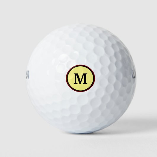 Vet monogram in twee cirkels en gele achtergrond golfballen (Voorkant)