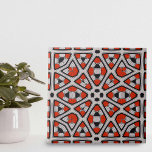 Vet rood zwart wit symmetrisch geometrisch patroon tegeltje<br><div class="desc">Het ontwerp van deze keramische tegel is voornamelijk samengesteld uit symmetrische vormen, met diamanten en sterretjes als de meest opvallende. Elke vorm is gevuld met ingewikkelde interne patronen, waardoor een laag complexiteit aan het algemene ontwerp wordt toegevoegd. Het kleurenschema is vet en opvallend, met levendige rode elementen in het zwart,...</div>