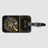 Vetgedrukte gouden trompet omgeven door ritmische  bagagelabel (Voorkant (horizontaal))