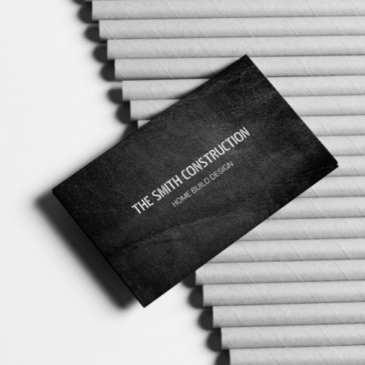 Vetgedrukte moderne constructie zwart beton getext visitekaartje