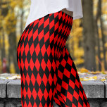 Vetgedrukte rode en zwarte harlekijncontrolepatroo leggings<br><div class="desc">Bold and Vibrant: Maak een statement met deze opvallende Harlequin-leggings! Met een dynamisch, kleurrijk patroon zijn ze de perfecte combinatie van moderne flair en speelse energie. Of je nu op een casual dag bent of je aankleedt om indruk te maken, deze leggings zullen je op je gemak houden terwijl je...</div>