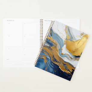 Vetgedrukte splash van goud en blauw planner