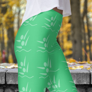 Vetgroene vrouwen gesynchroniseerd zwempatroon leggings