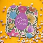 Vetkleurige Florals Stijlvol Pasen | Paarse eieren Papieren Bordje<br><div class="desc">Deze prachtige paaspapieren borden zijn voorzien van een handgetekend bloemontwerp in magenta roze,  paars,  oranje,  goudgeel,  blauw en groen boven een aangepaste kleur achtergrond (weergegeven in lichte perziken). Stijlvolle tekst,  "Happy Easter" staat uit tegen een paars paasei. T</div>