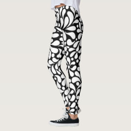 Vette moderne witte bloemen op zwarte achtergrond leggings
