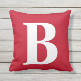 Vette rode monogram in de openlucht buitenkussen