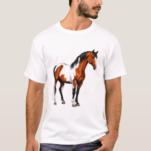 Vetvlekkig paard staat in een grazig veld t-shirt