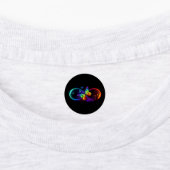 Vibrant infinity with rainbow butterfly on black labels (Aangebracht)