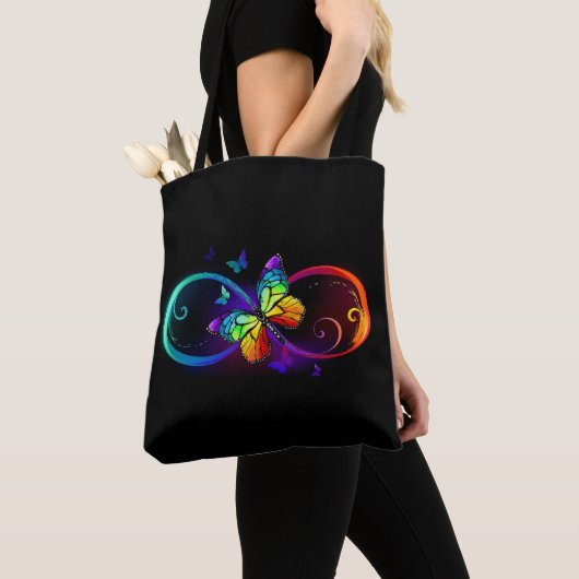 Vibrant infinity with rainbow butterfly on black tote bag (Dichtbij)