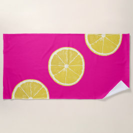 Vibrant Lemon Slice Pattern on Pink Beach Towel Strandlaken