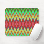 Vibrant mouse pad with bold, multicolored zigzag muismat<br><div class="desc">Vibrant mouse pad with bold, multicolored zigzag pattern featuring red and green diamond shapes. A white mouse rests on it, creating a dynamic, lively vibe.</div>