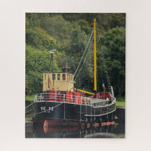 Vic32 puffervaartuig in Crinan Canal-bekken, Schot Legpuzzel