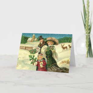 Victorian family in the snow Christmas scene Kaart