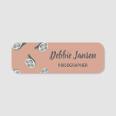 Videobanden grijs patroon beige naamplaatje (Voorkant)