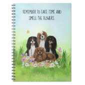 Vier Cavalier King Charles Spaniels in Flowers Notitieboek (Voorkant)