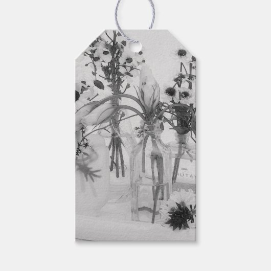 Vier flessen en witte bloemen cadeaulabel (Voorkant)