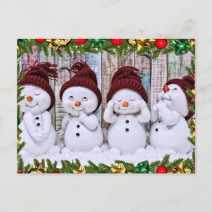 Vier glimlachende speelgoed sneeuwmannen briefkaart