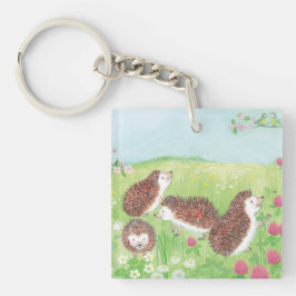 Vier kleine egel in de bloeiende wei sleutelhanger