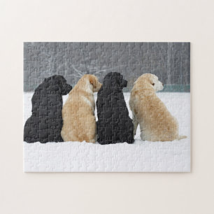 Vier labrador honden in sneeuw legpuzzel