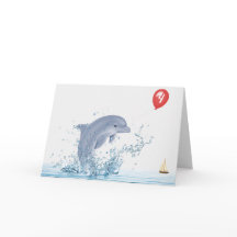 Vierde verjaardag dolfijn met rode ballon