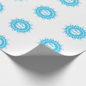 Vierige kersttekst rond lijst snowflake blauw met cadeaupapier (Hoek)