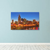 View of the city skyline at dusk canvas afdruk (Insitu (Houten vloer))