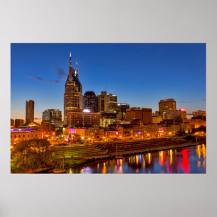 View of the city skyline at dusk poster
