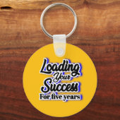 Vijf jaar lang succes boeken – Motivatie Sleutelhanger (Voorkant)