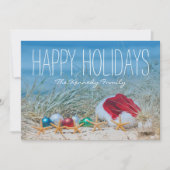 Vijf zeesterren op een strand met een kerstmuts feestdagenkaart (Voorkant)