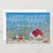 Vijf zeesterren op een strand met een kerstmuts feestdagenkaart (Voorkant / Achterkant)