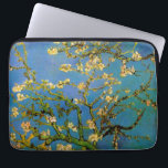 Vincent van Gogh - Bloeiende amandelboom Laptop Sleeve<br><div class="desc">Blossoming Almond Tree (1890) van Van Gogh is een post-impressionisme, een mooie kunstschilderij die nog leeft. Een tak van een amandelboom in bloem in een lentuin met de blauwe hemel op de achtergrond. Mooie witte bloemen. Over de kunstenaar: Vincent Willem van Gogh (1853-1890) was een postimpressionistische schilder wiens werk het...</div>