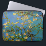 Vincent van Gogh - Bloeiende amandelboom Laptop Sleeve<br><div class="desc">Blossoming Almond Tree (1890) van Van Gogh is een post-impressionisme, een mooie kunstschilderij die nog leeft. Een tak van een amandelboom in bloem in een lentuin met de blauwe hemel op de achtergrond. Mooie witte bloemen. Over de kunstenaar: Vincent Willem van Gogh (1853-1890) was een postimpressionistische schilder wiens werk het...</div>