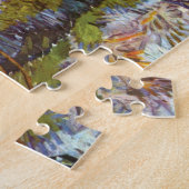 Vincent Van Gogh – Boomgaard in bloei met populier Legpuzzel (Zijkant)