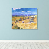 Vincent van Gogh - Tarwestacks met maaier Canvas Afdruk (Insitu (Houten vloer))