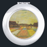 Vincent Van Gogh Tulpenvelden Compact Spiegelcadea Handtas Spiegeltje<br><div class="desc">Vincent van Gogh Tulpenvelden Compacte spiegel Tulpenvelden, ook wel Bloemenperken genoemd, is een olieverfschilderij van Vincent van Gogh uit 1883. Het werd geschonken aan de National Gallery of Art in Washington DC in 1983. Bulb Fields was Van Goghs eerste tuinschilderij, in olieverf op doek gemonteerd op hout. Het werd gemaakt...</div>
