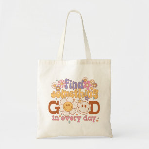Vind elke dag iets goeds tote bag
