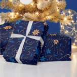 Vines Flowers Botanisch Sinaasappel Blue Christmas Cadeaupapier<br><div class="desc">Wikkel uw geschenken in een uitbarsting van vakantiecharme met dit elegante donkerblauwe kerstinpakpapier. De rijke, diepblauwe achtergrond zet het podium voor een modern en speels patroon van wervelende wijnstokken, delicate sneeuwvlokken en weelderig groen. De accenten van sinaasappel en blauw geven een frisse en levendige draai aan het klassieke vakantiepalet, waardoor...</div>